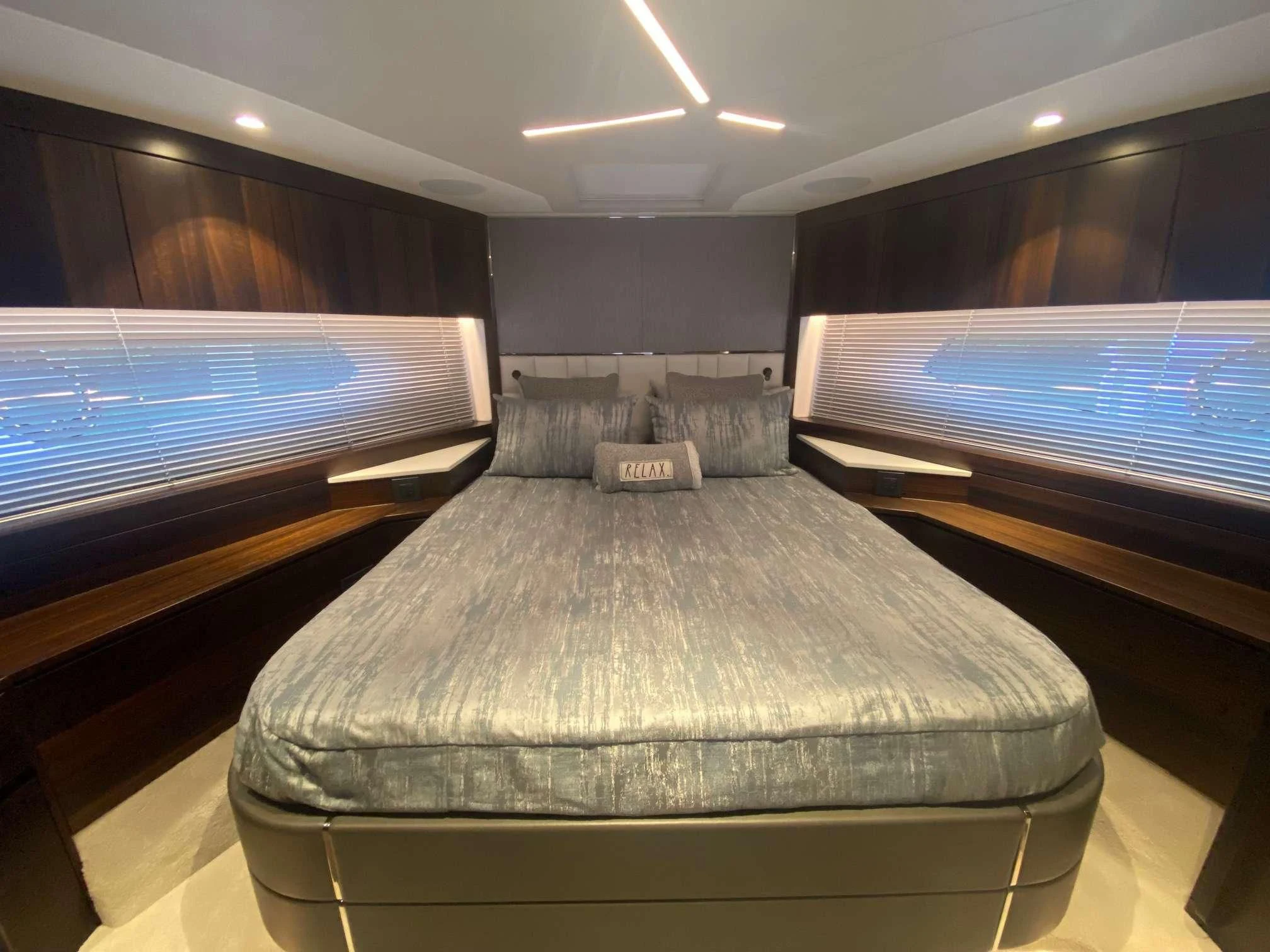a bed in a room aboard LAGO PARADISE Yacht for Sale