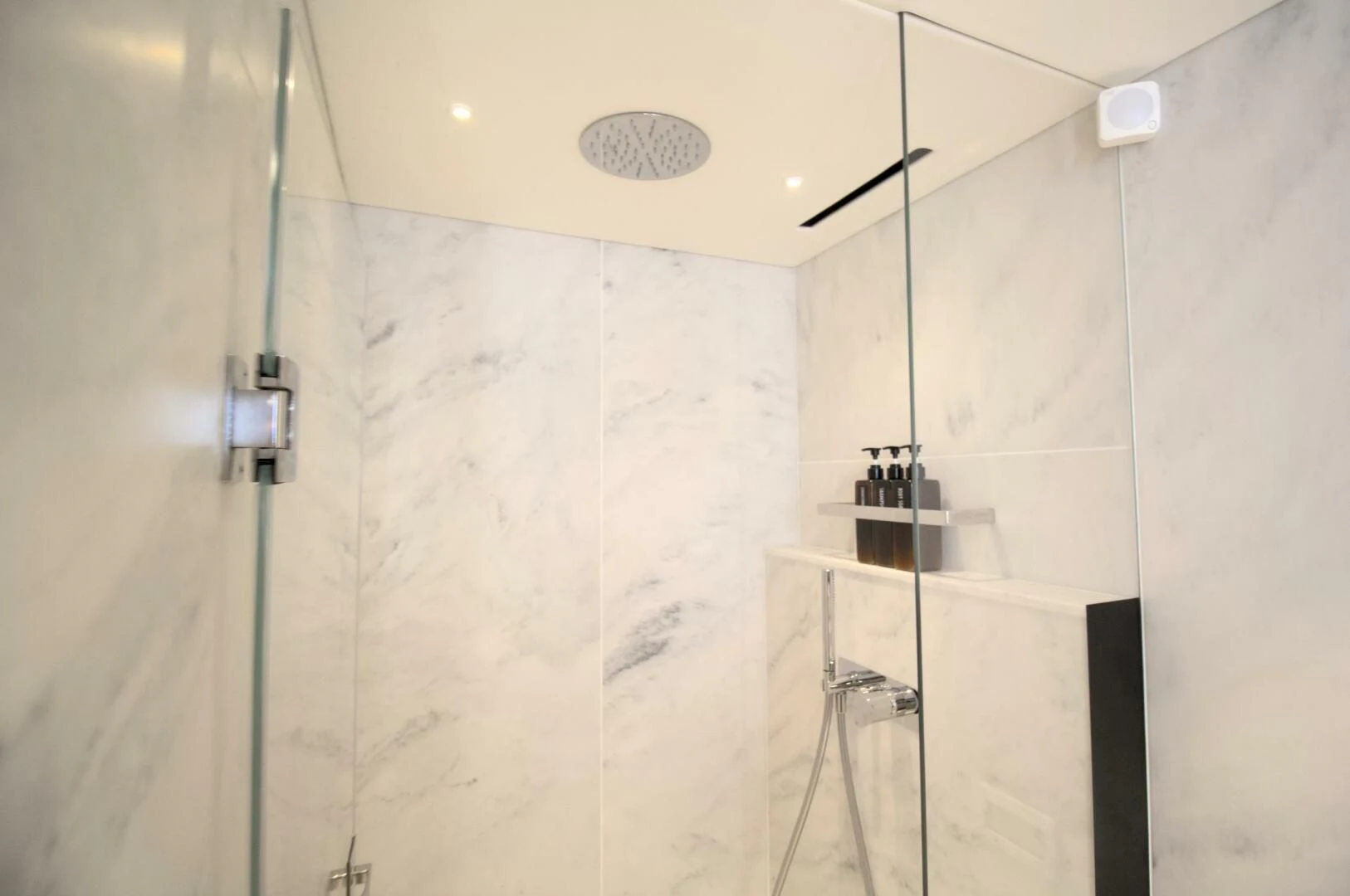 a shower with a shower curtain aboard LAGO PARADISE Yacht for Sale