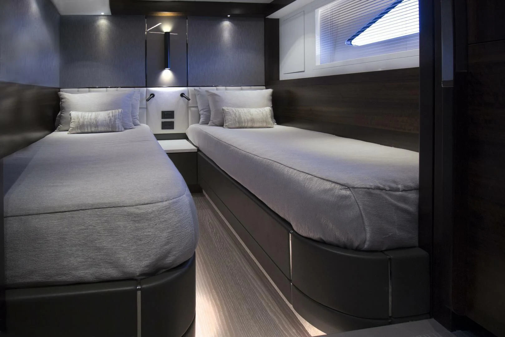 a room with two beds aboard LAGO PARADISE Yacht for Sale