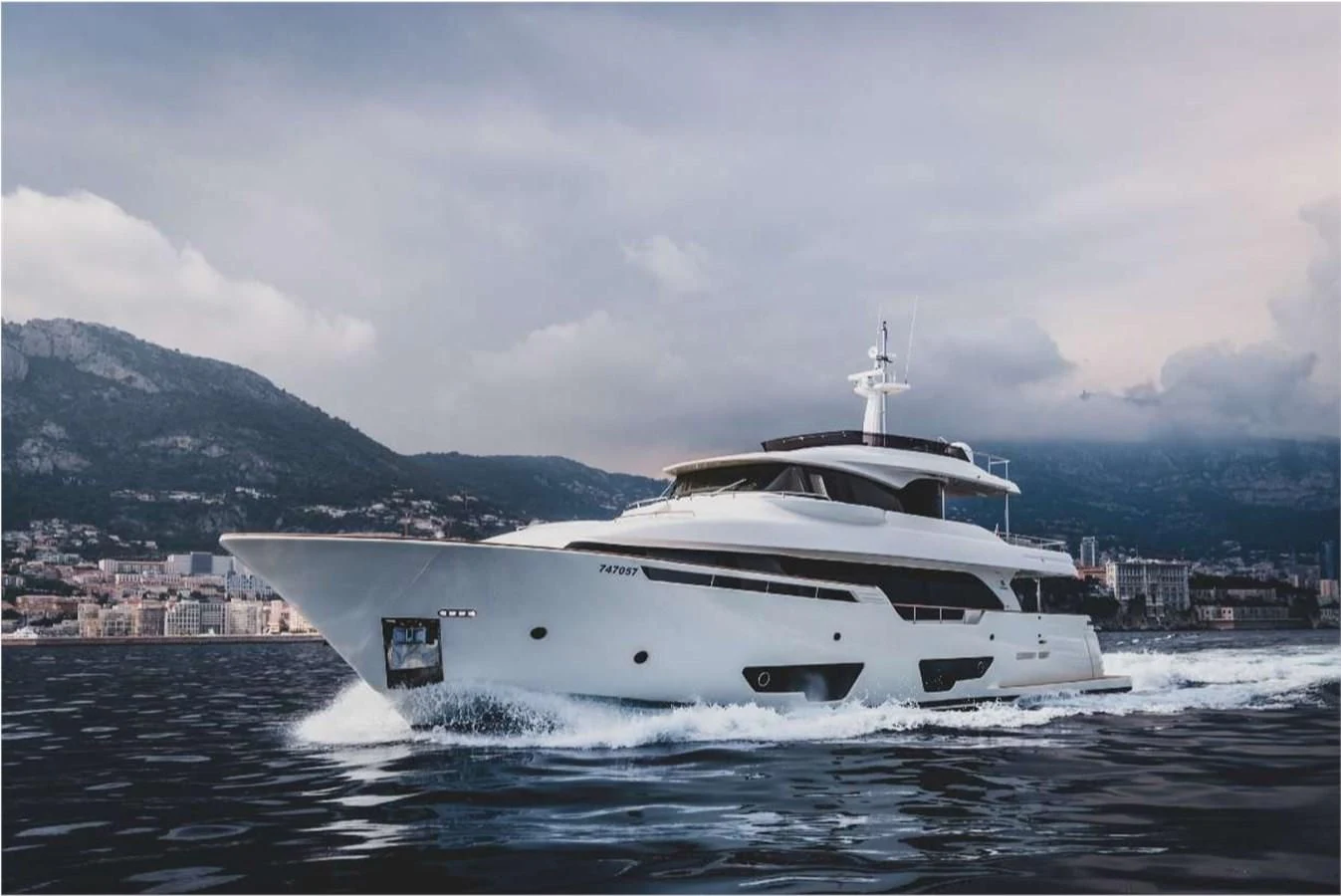 a white yacht on the water aboard SEVEN Yacht for Sale