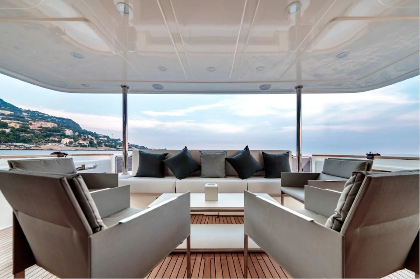 a boat with seats and a view of the ocean aboard SEVEN Yacht for Sale