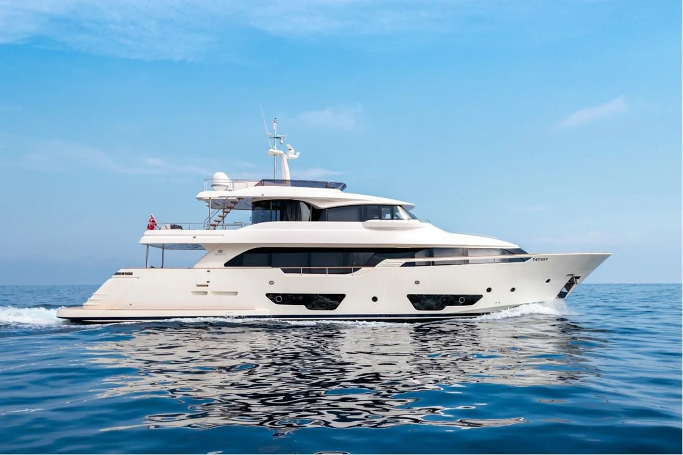 a white yacht in the water aboard SEVEN Yacht for Sale