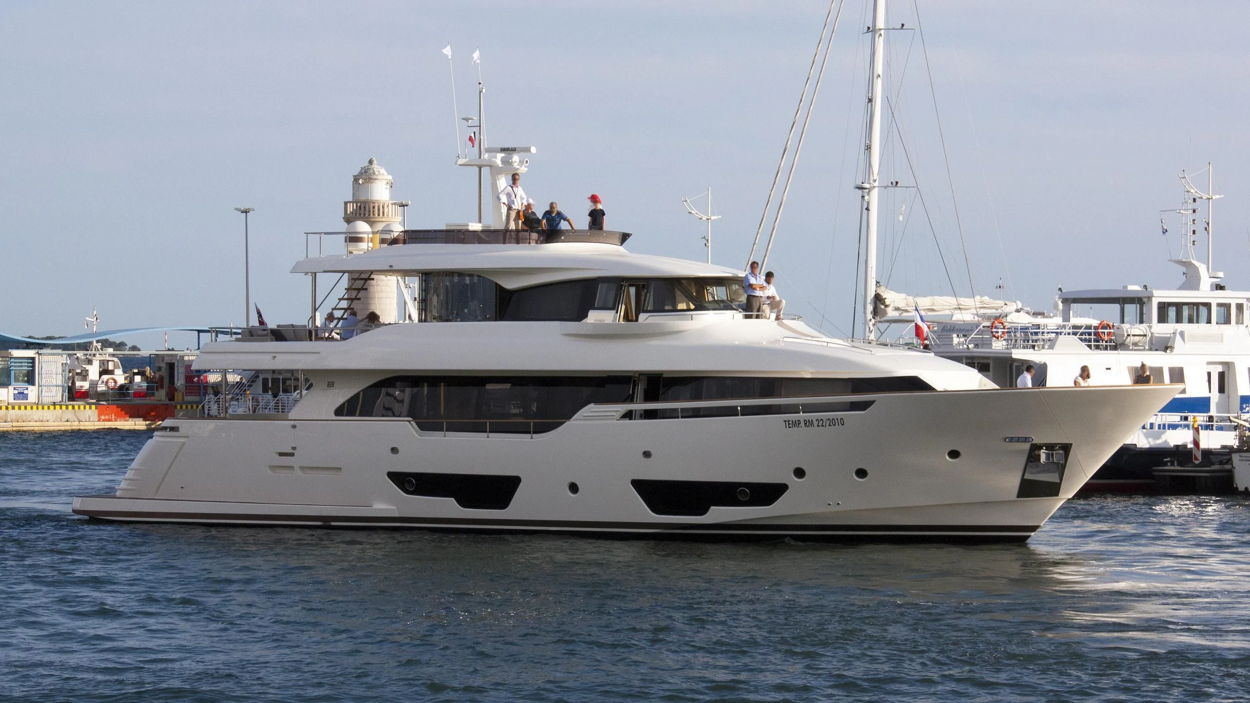 a large white boat in the water aboard SEVEN Yacht for Sale