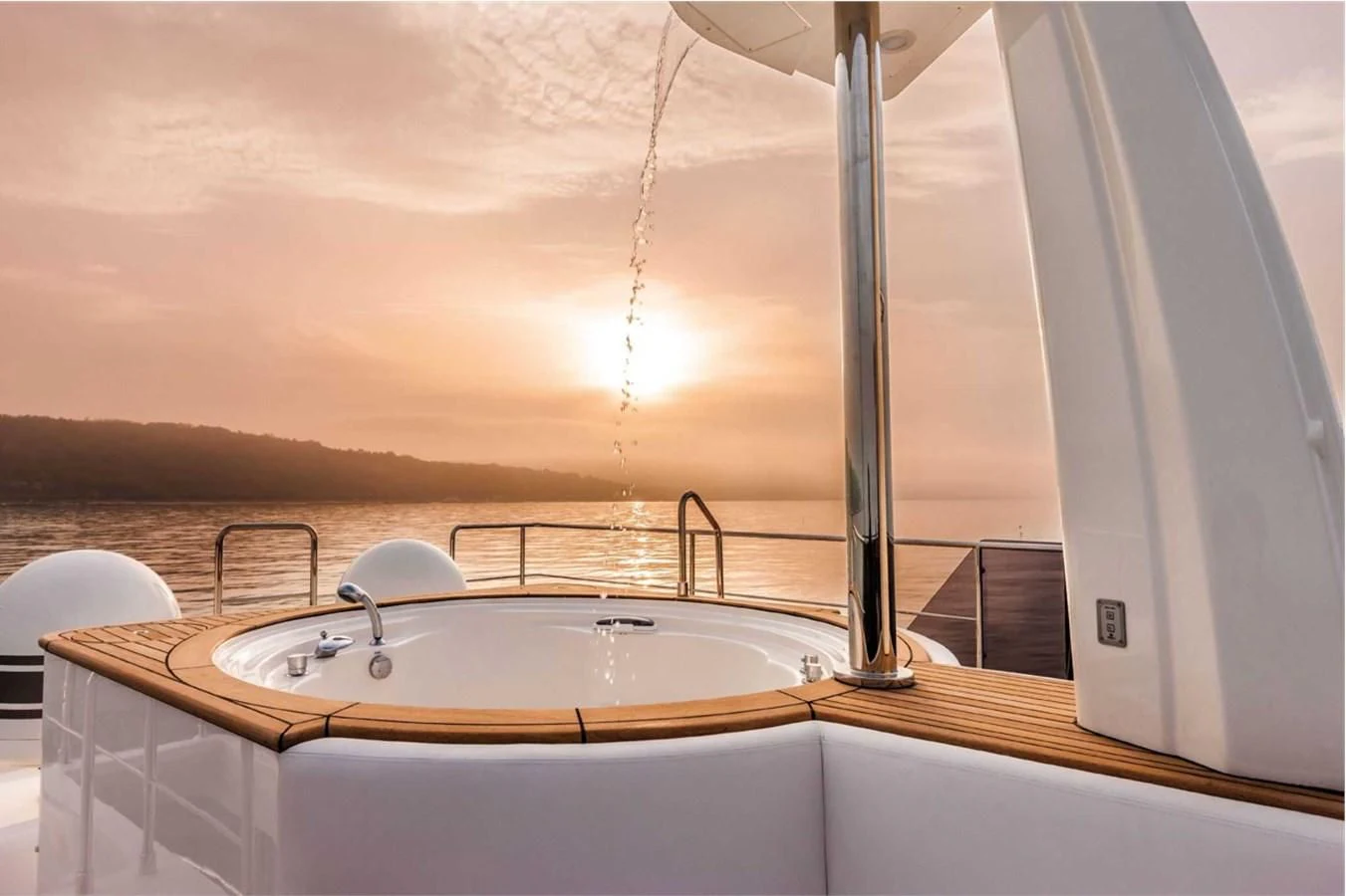 a bathtub with a sink aboard SEVEN Yacht for Sale