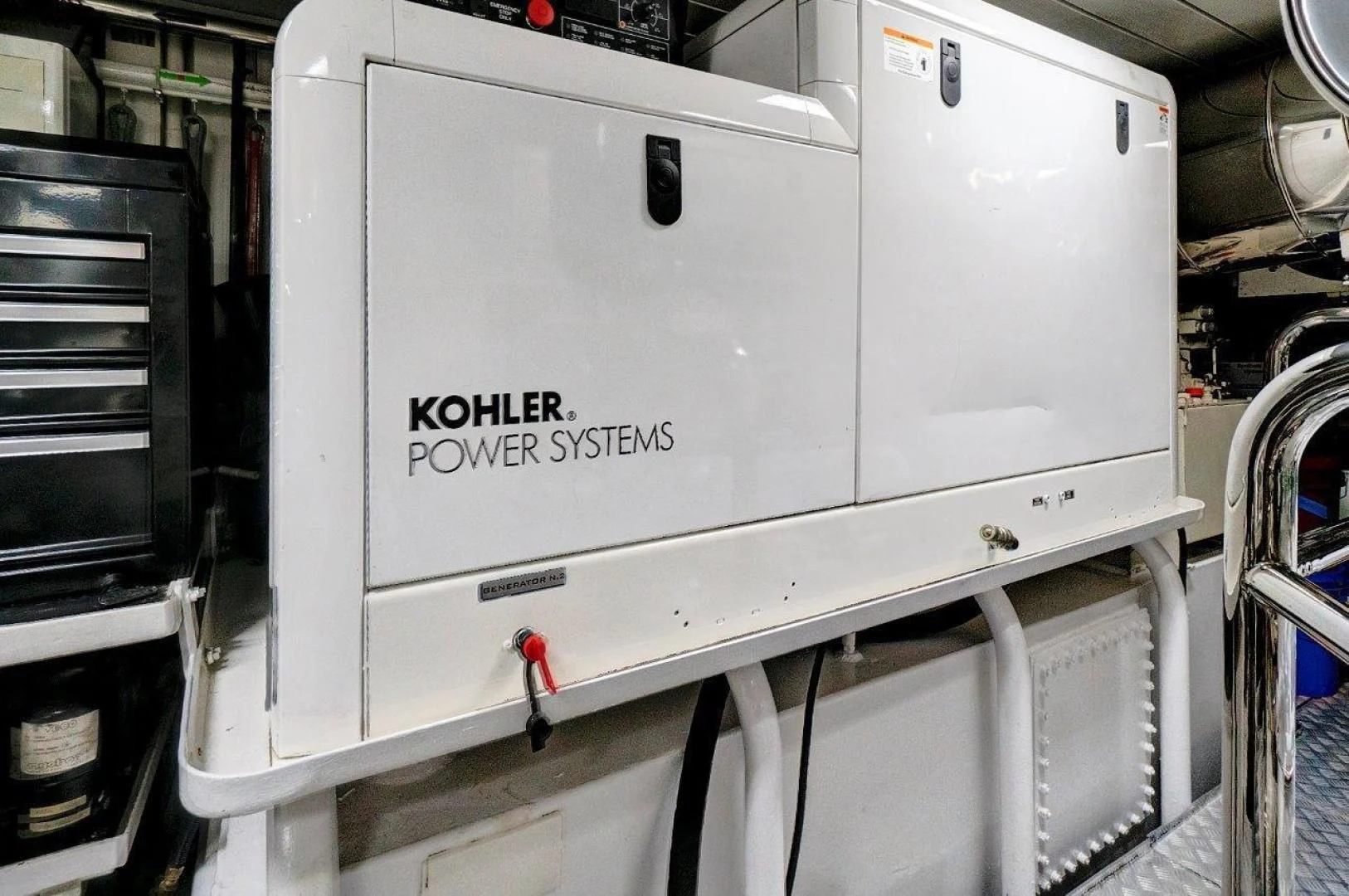 a white machine with black text aboard VIVERE Yacht for Sale