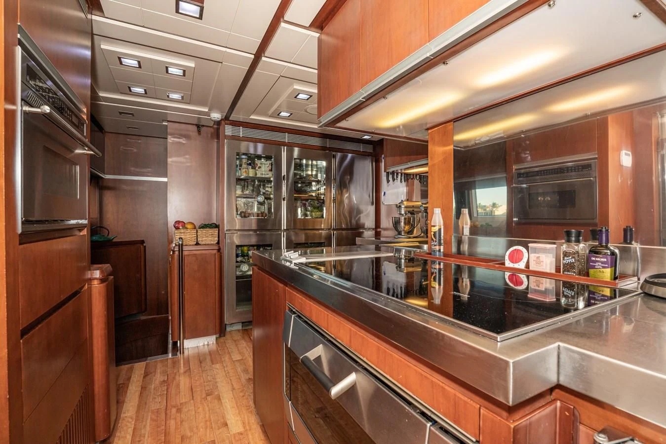 a kitchen with a bar and a bar aboard VIVERE Yacht for Sale