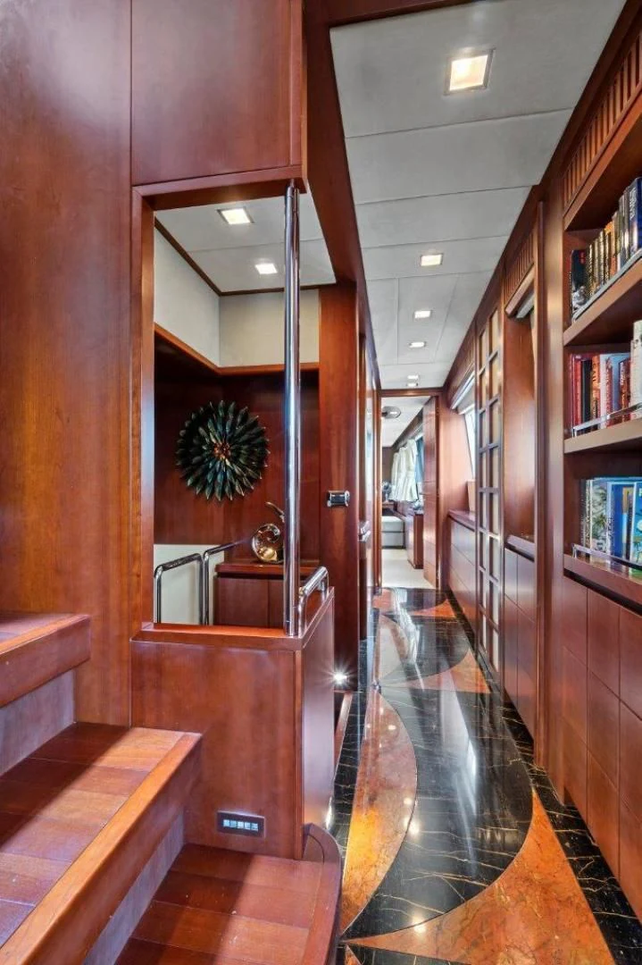 a hallway with wood floors aboard VIVERE Yacht for Sale