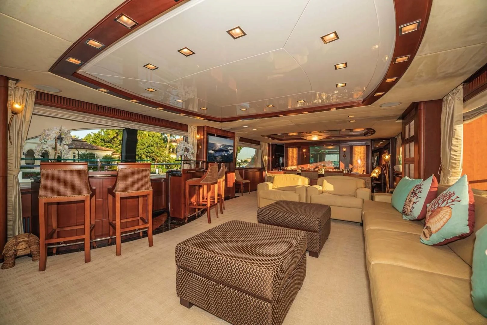 a living room with a couch and a table aboard VIVERE Yacht for Sale