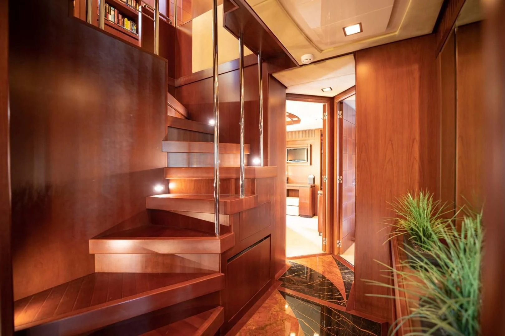 a hallway with wood walls aboard VIVERE Yacht for Sale