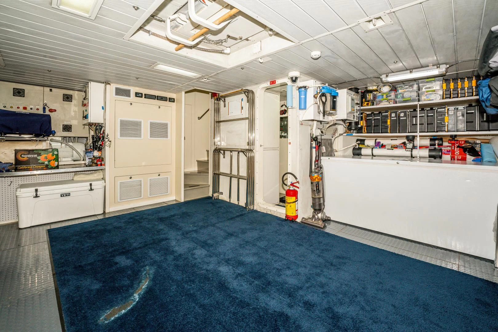 a room with a blue floor aboard VIVERE Yacht for Sale