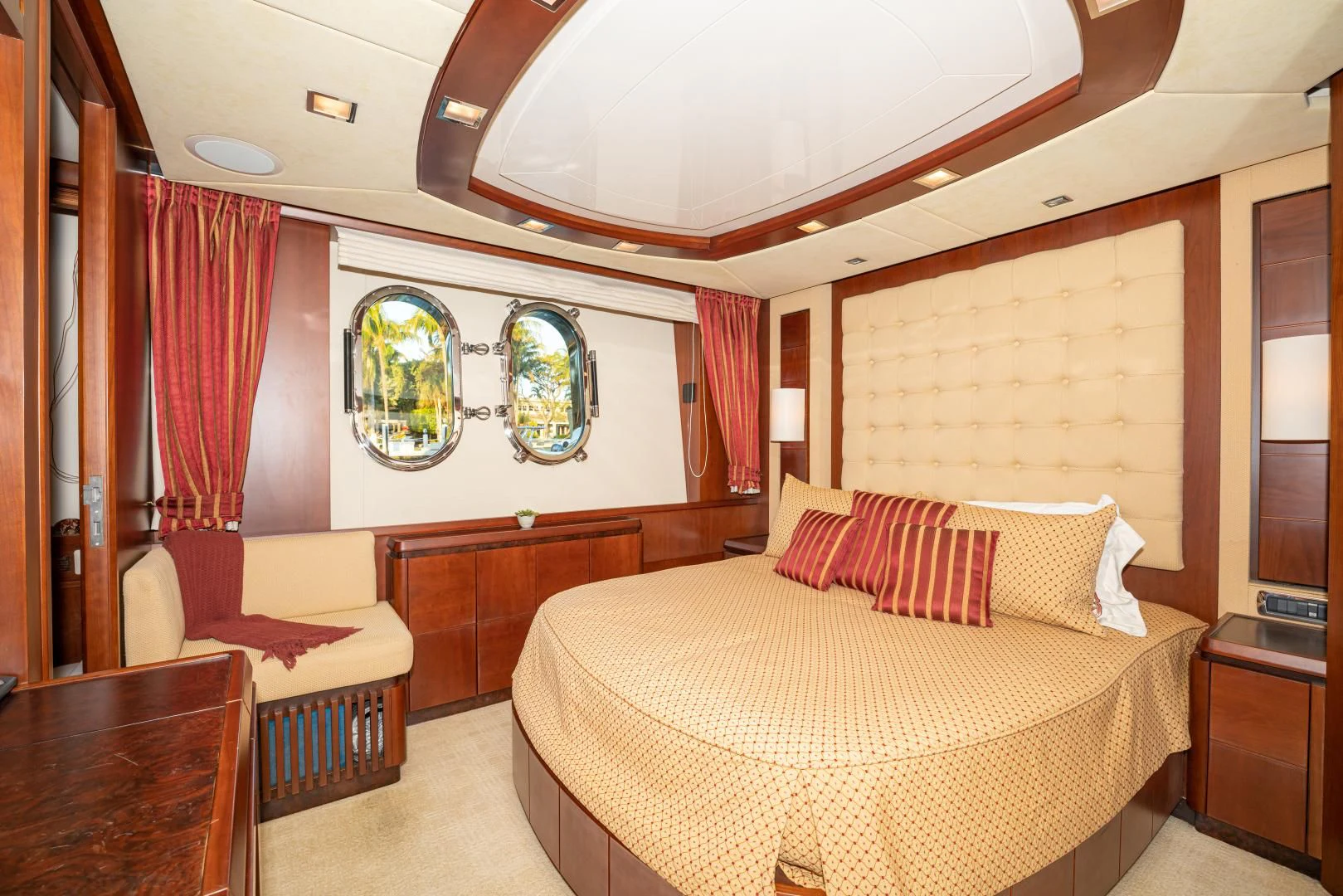 a bedroom with a large bed aboard VIVERE Yacht for Sale
