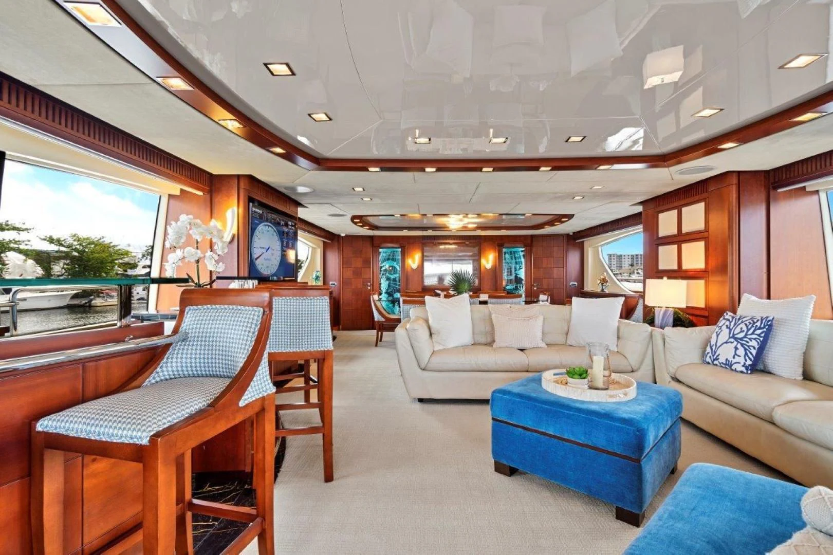 a living room with a large open window aboard VIVERE Yacht for Sale
