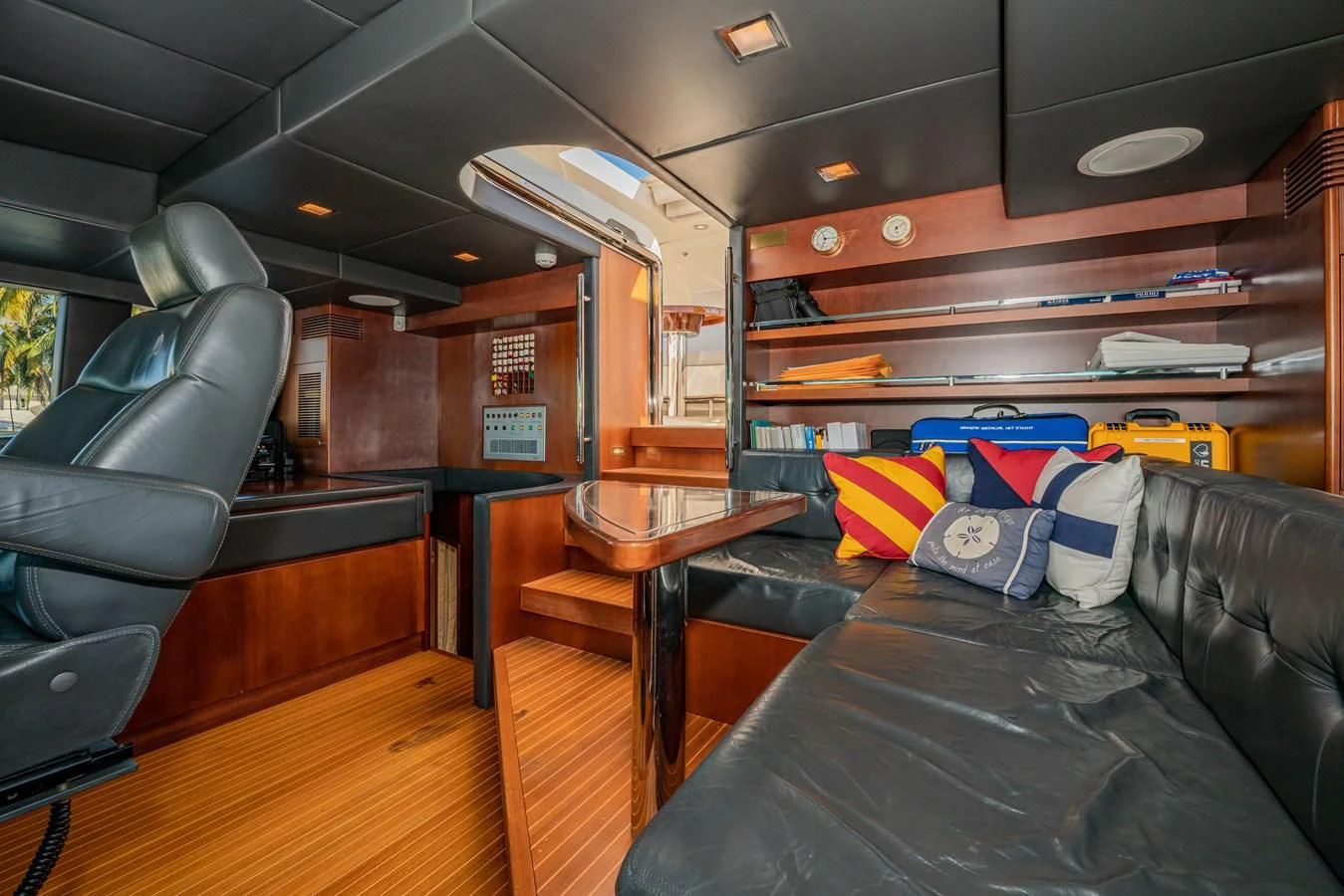 a leather couch in a room aboard VIVERE Yacht for Sale