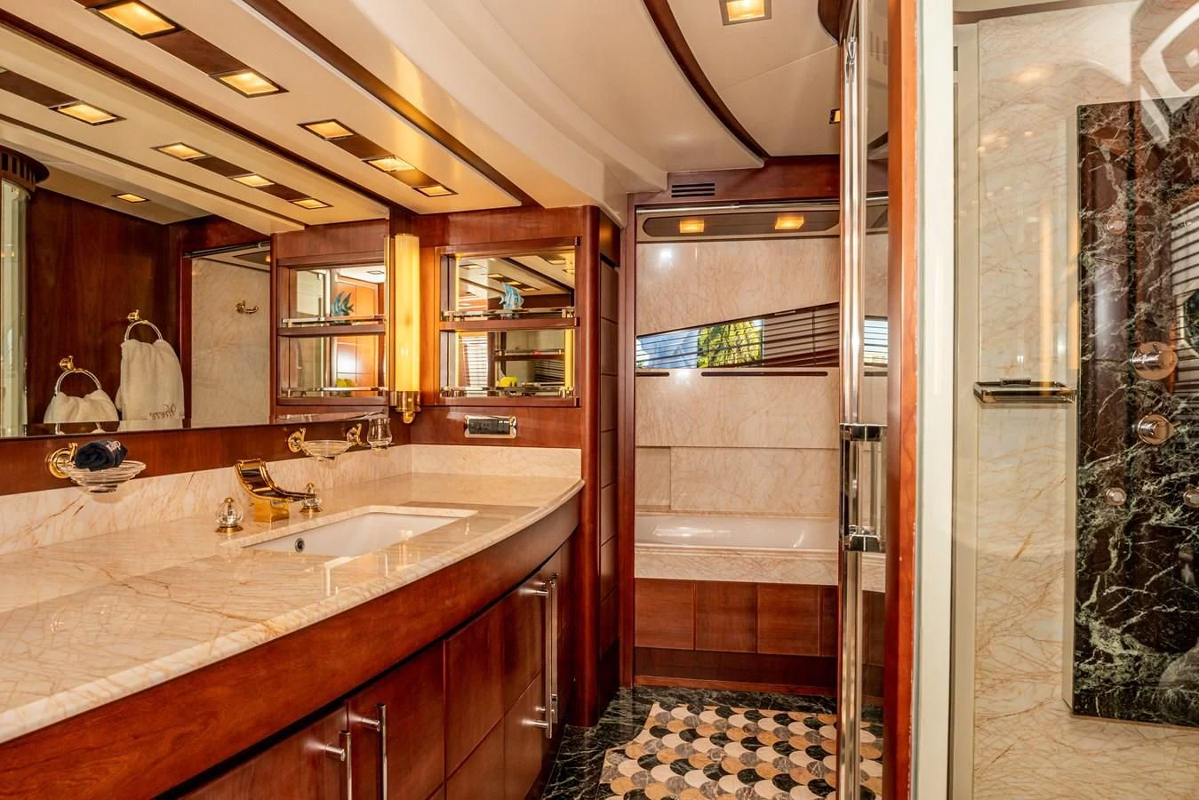 a bathroom with a sink and a shower aboard VIVERE Yacht for Sale
