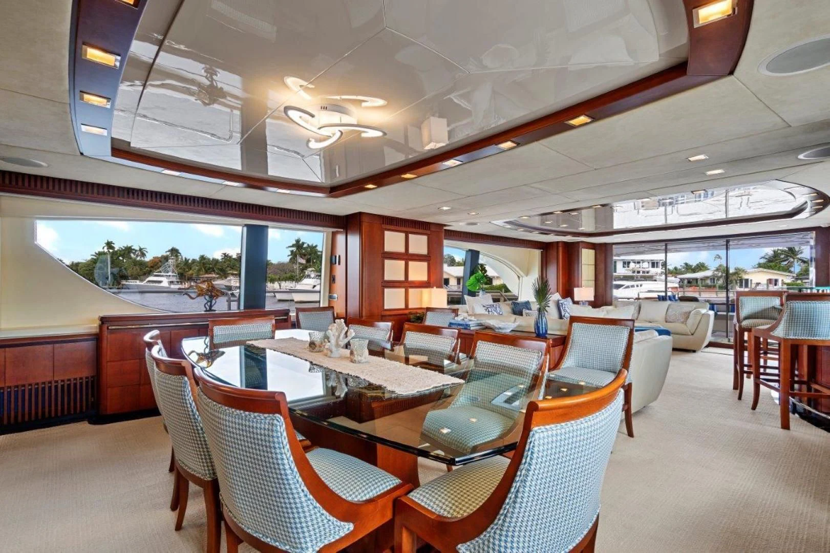 a room with tables and chairs aboard VIVERE Yacht for Sale