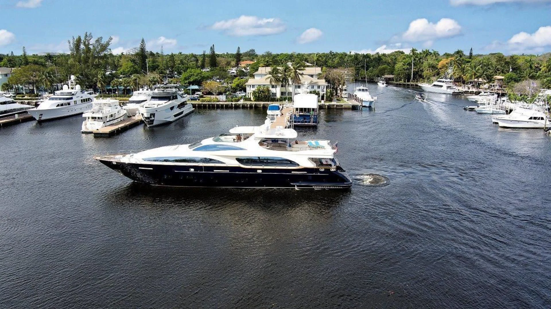 a group of boats in a harbor aboard VIVERE Yacht for Sale