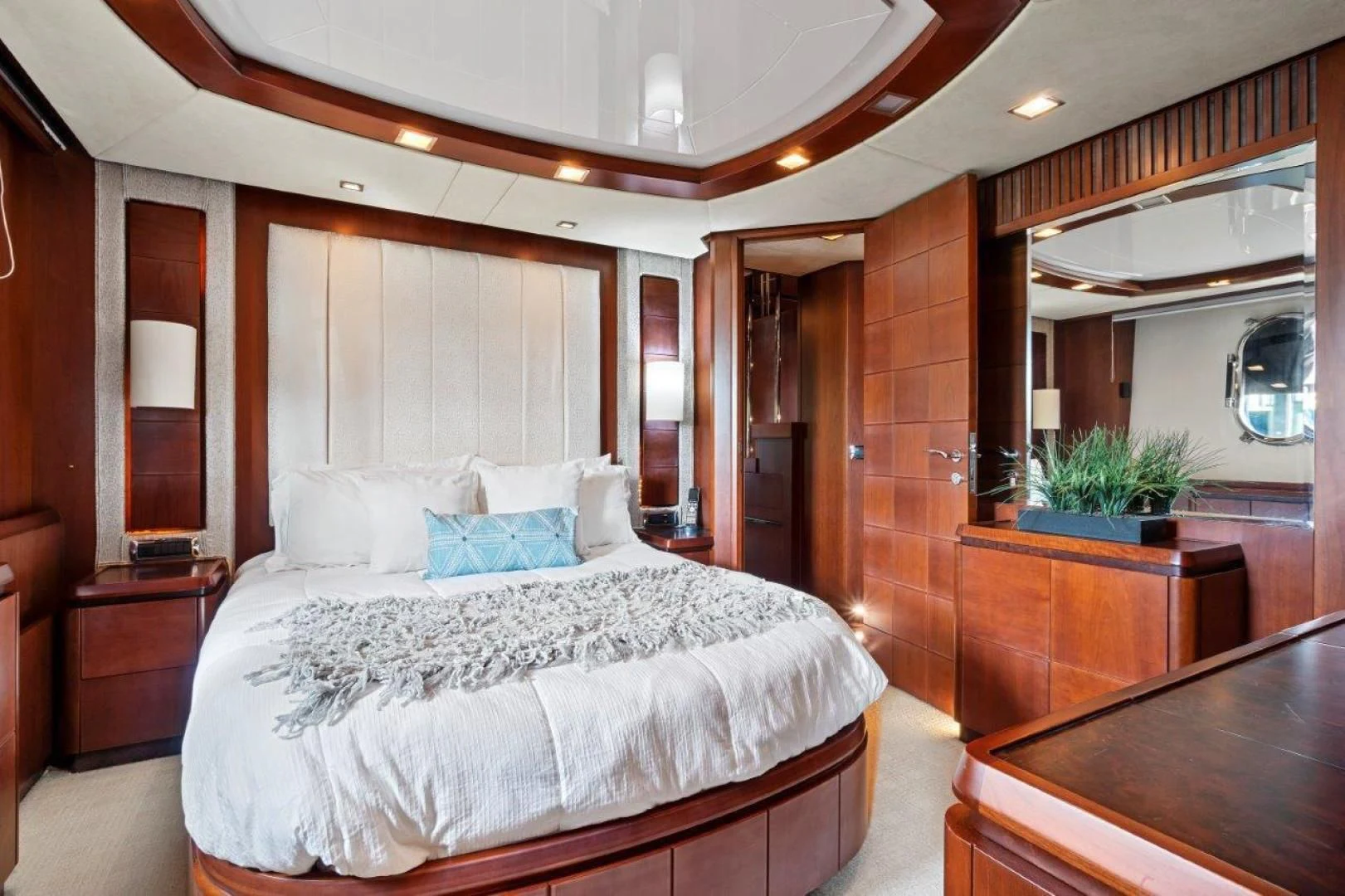a large bedroom with a large bed aboard VIVERE Yacht for Sale