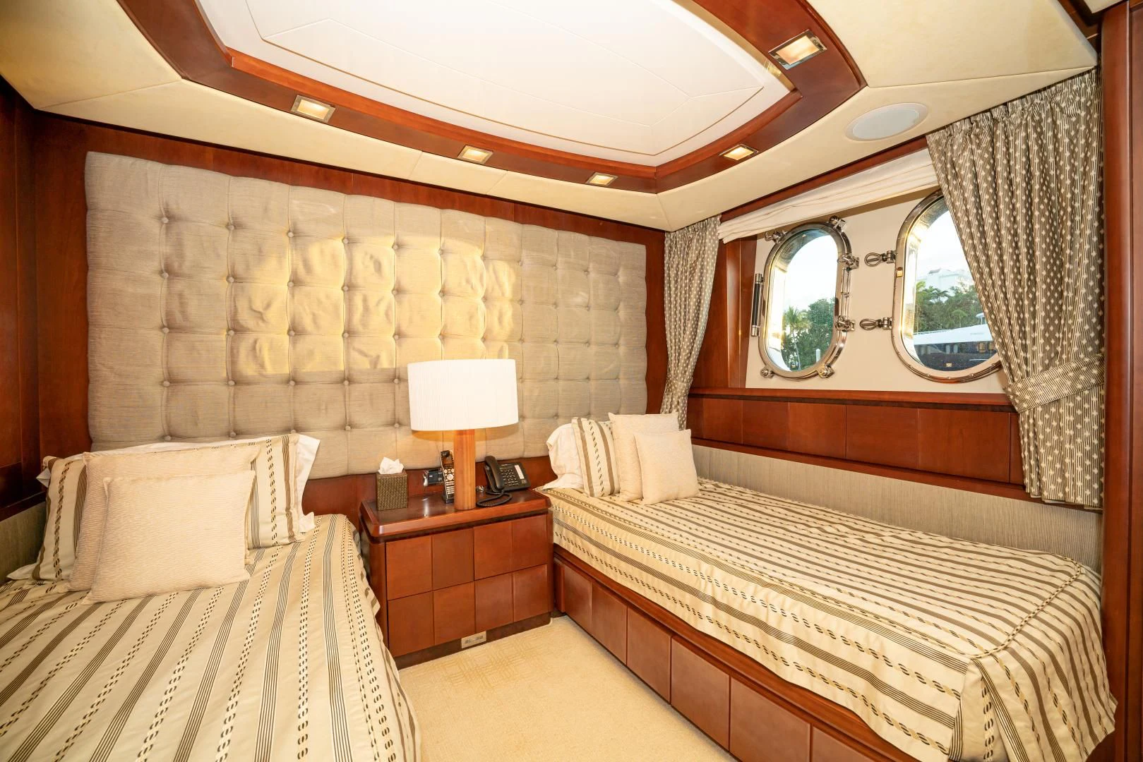 a couple of beds in a hotel room aboard VIVERE Yacht for Sale