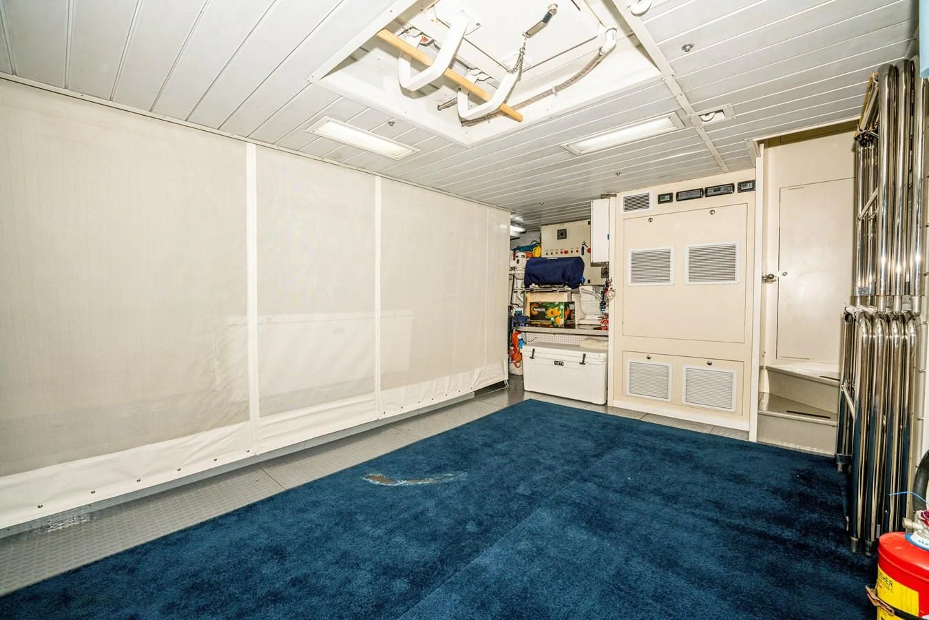 a room with a blue floor aboard VIVERE Yacht for Sale