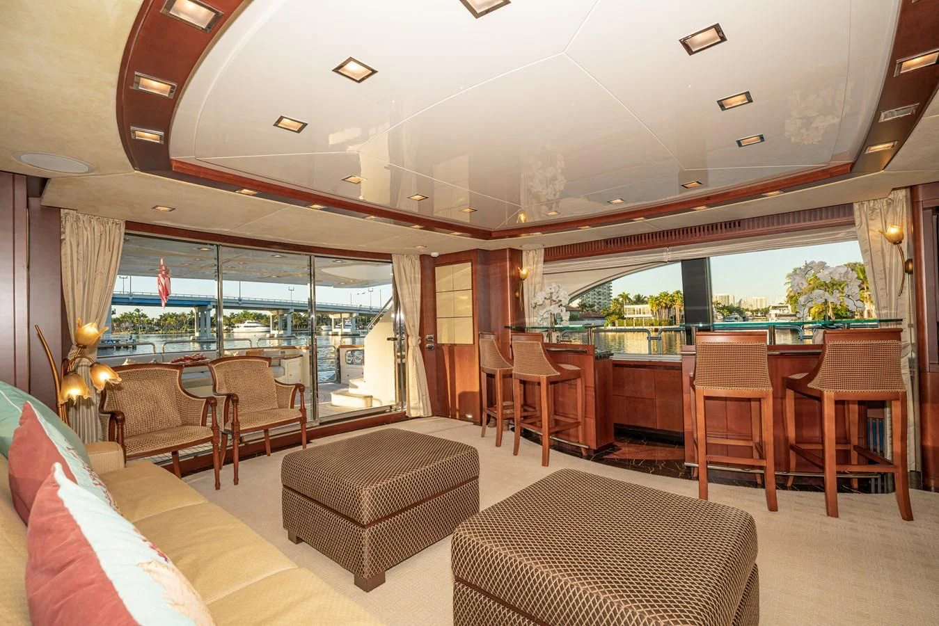 a living room with a large swimming pool aboard VIVERE Yacht for Sale
