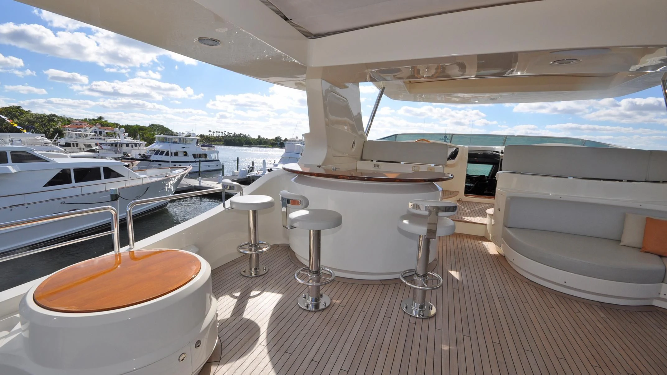 a room with a table and chairs aboard VIVERE Yacht for Sale