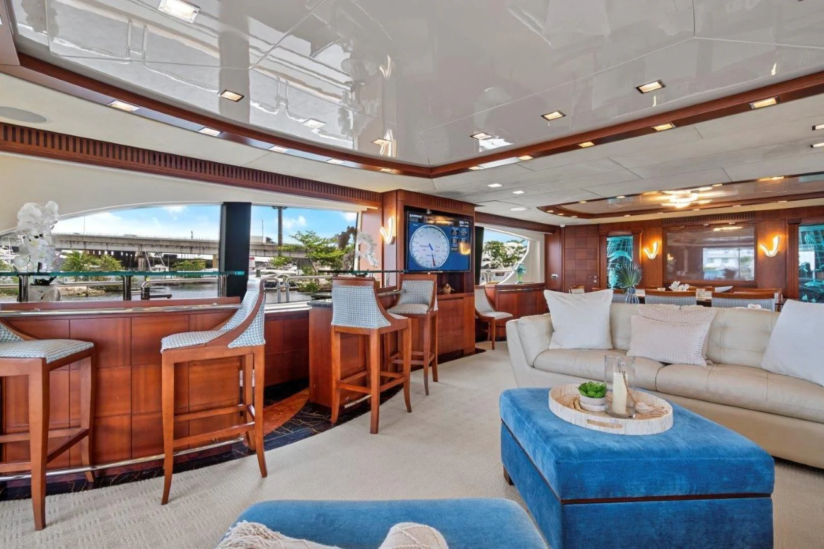 a room with a couch and a table and chairs aboard VIVERE Yacht for Sale