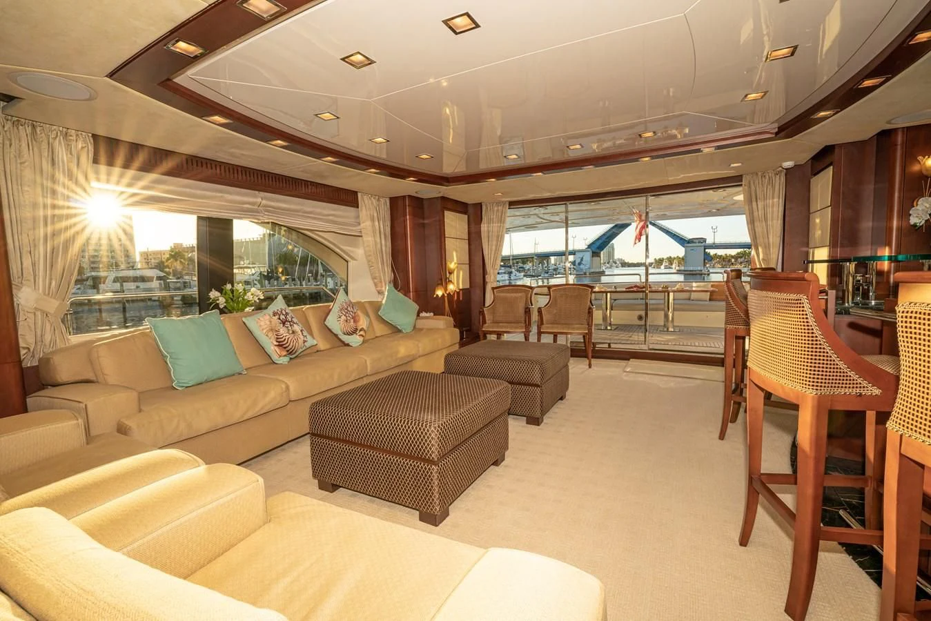 a living room with a couch and a table aboard VIVERE Yacht for Sale