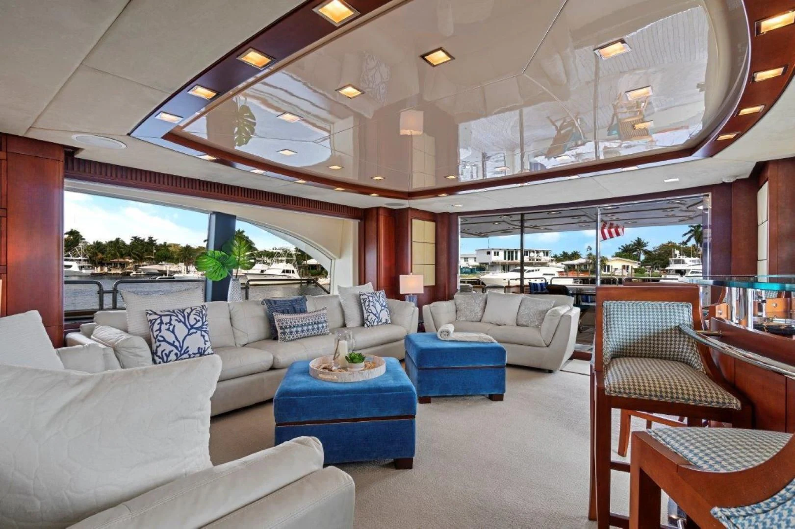 a living room with a large window aboard VIVERE Yacht for Sale