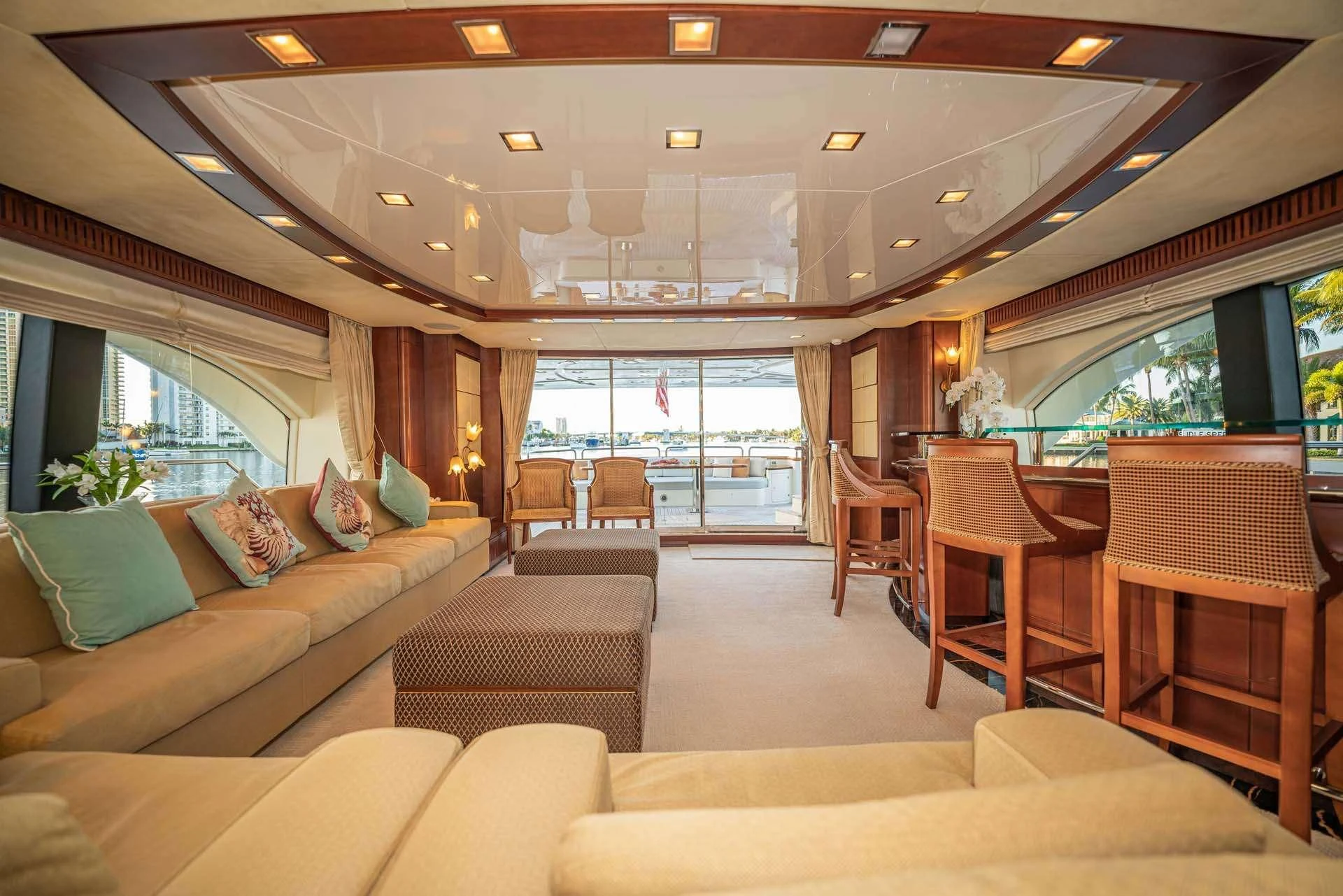 a living room with a couch and a table aboard VIVERE Yacht for Sale