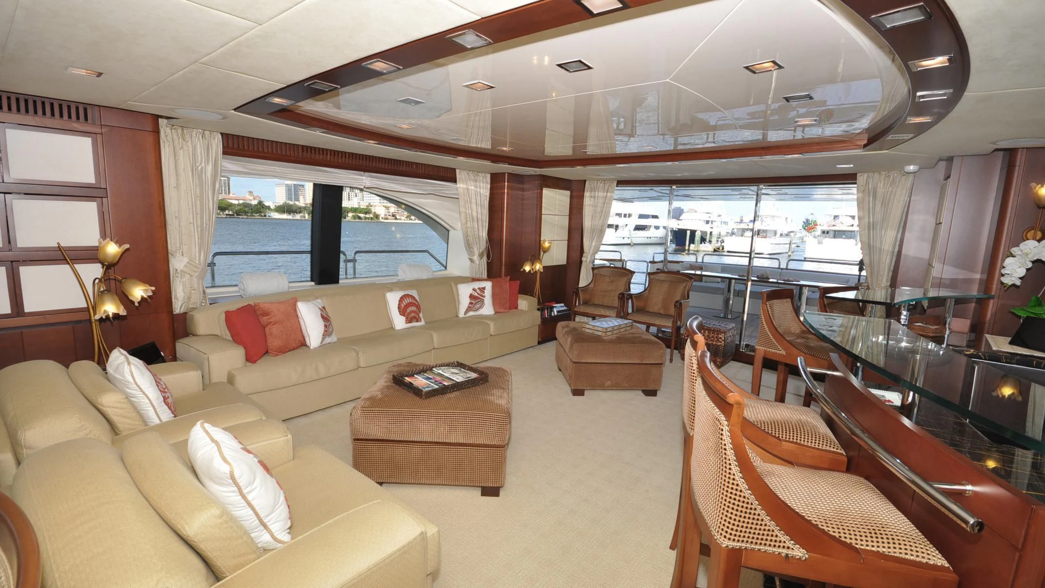 a living room with a large window aboard VIVERE Yacht for Sale