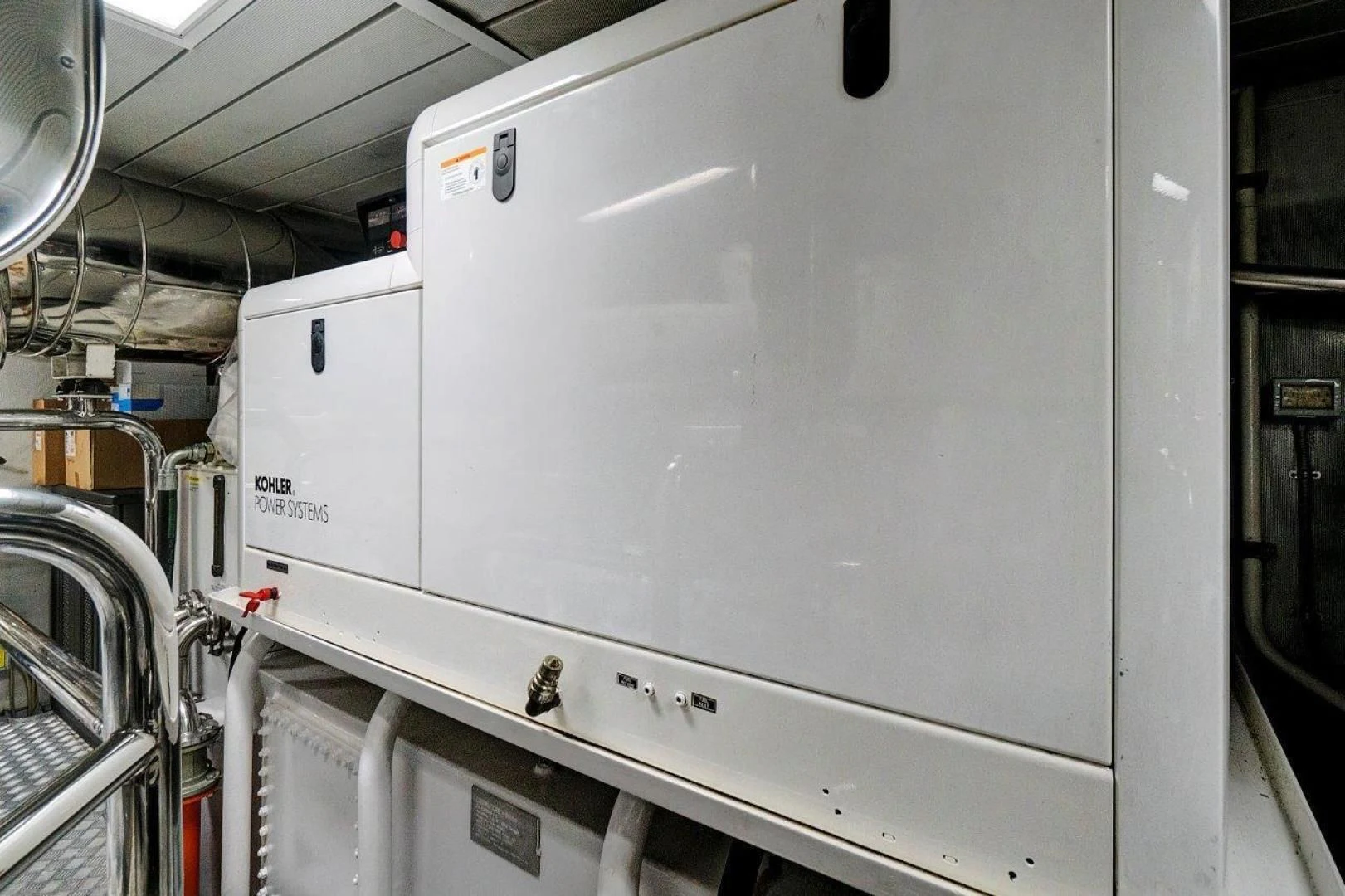 a large white machine aboard VIVERE Yacht for Sale