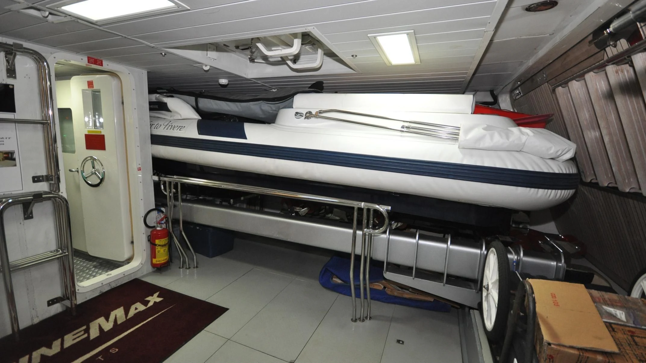 a room with a bed and a desk aboard VIVERE Yacht for Sale