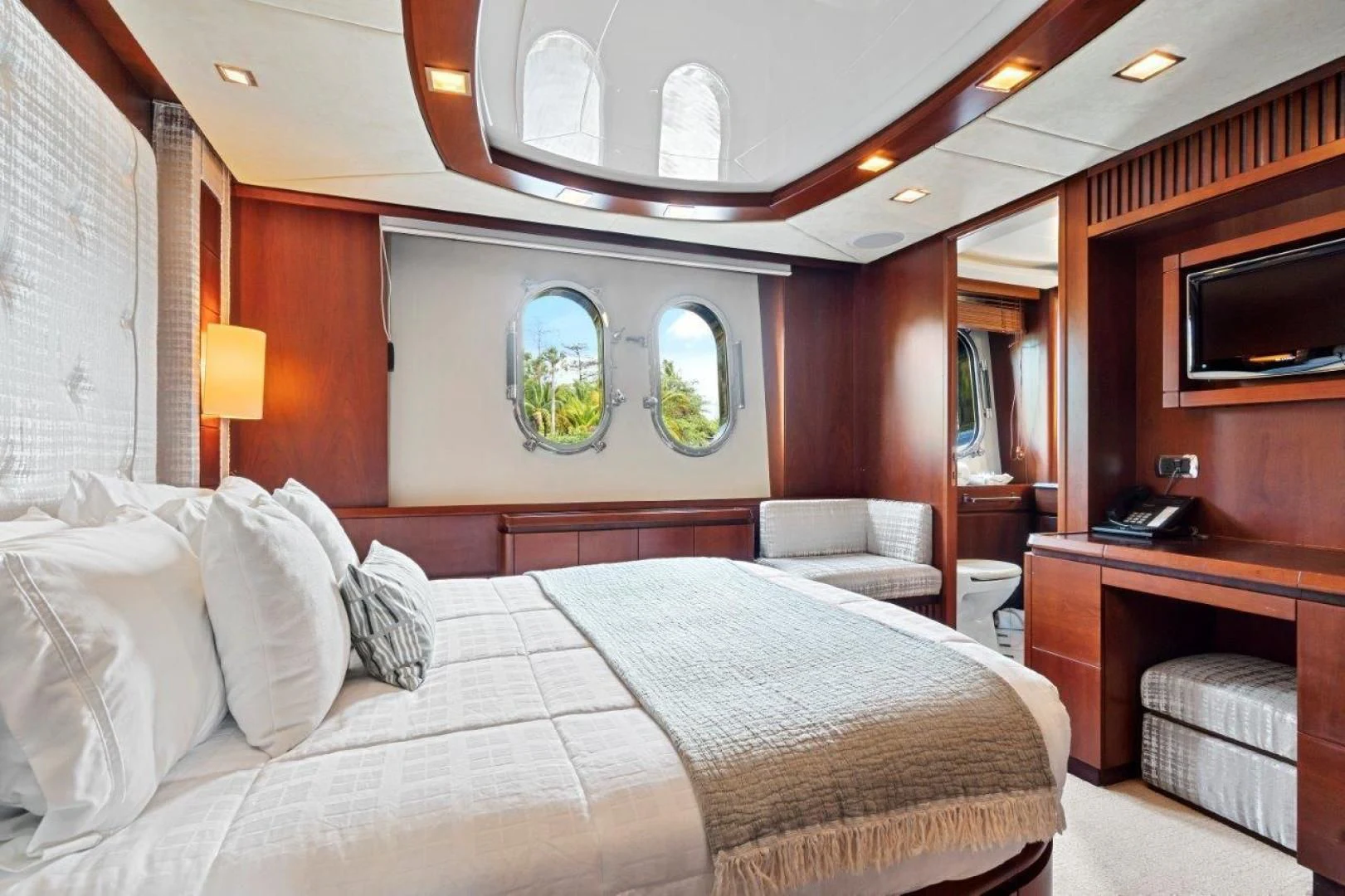 a bed in a room aboard VIVERE Yacht for Sale