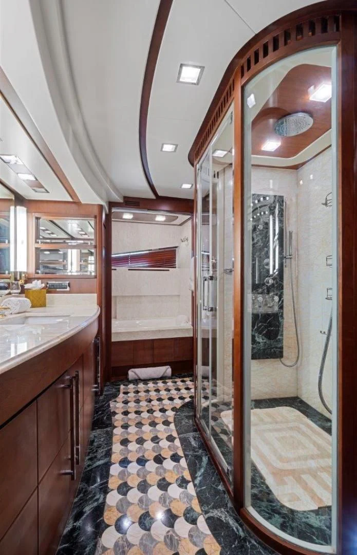 a bathroom with a shower unit aboard VIVERE Yacht for Sale