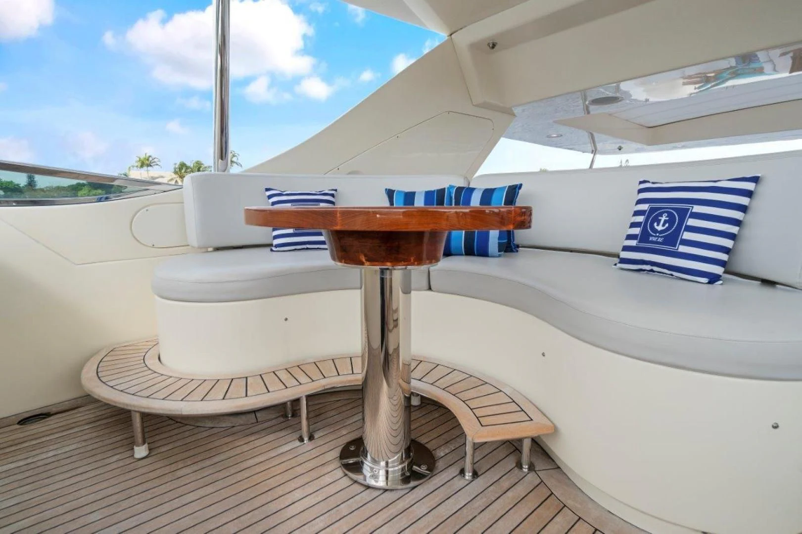 a table with a chair on it aboard VIVERE Yacht for Sale