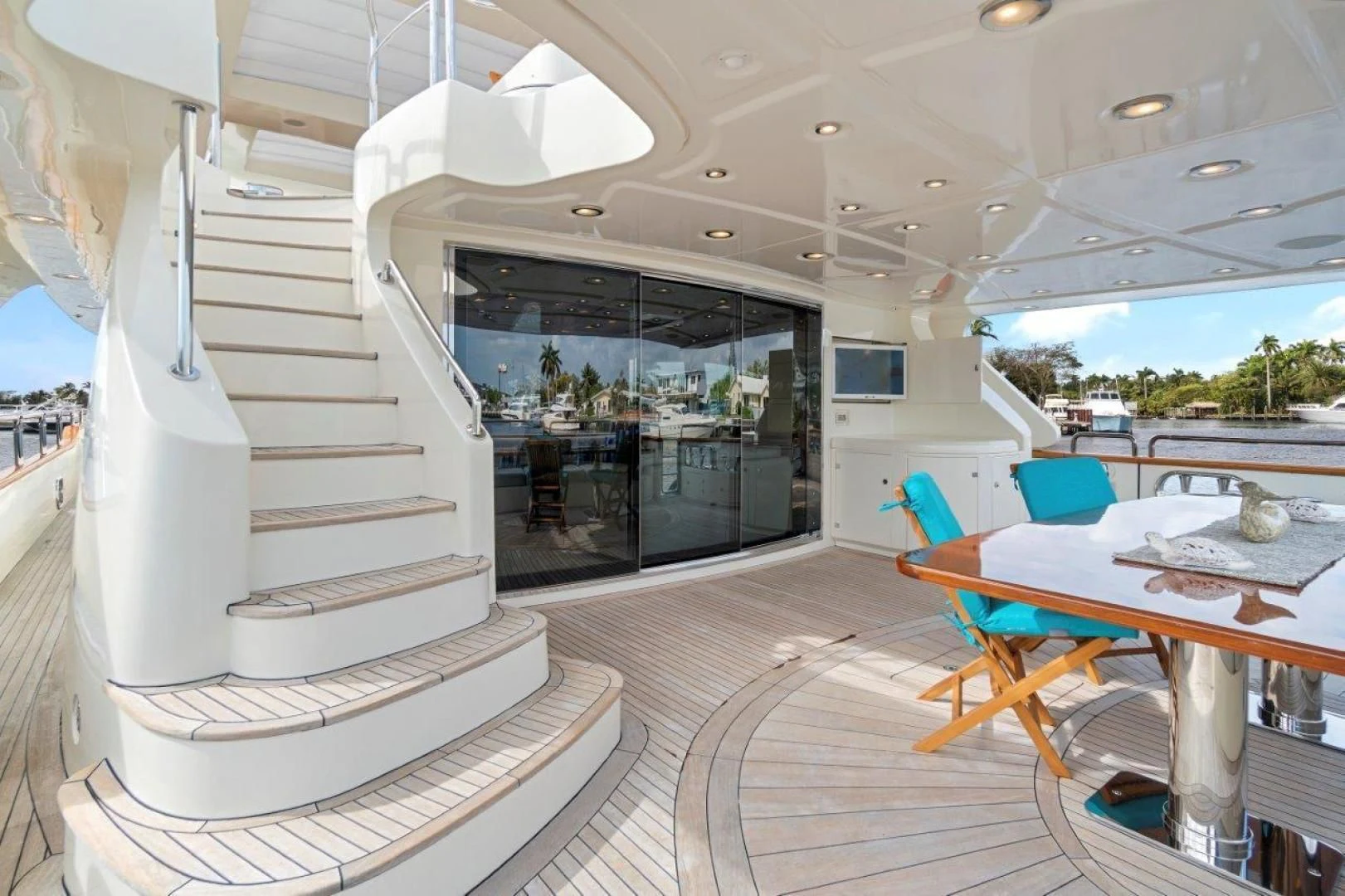 a white staircase in a room aboard VIVERE Yacht for Sale
