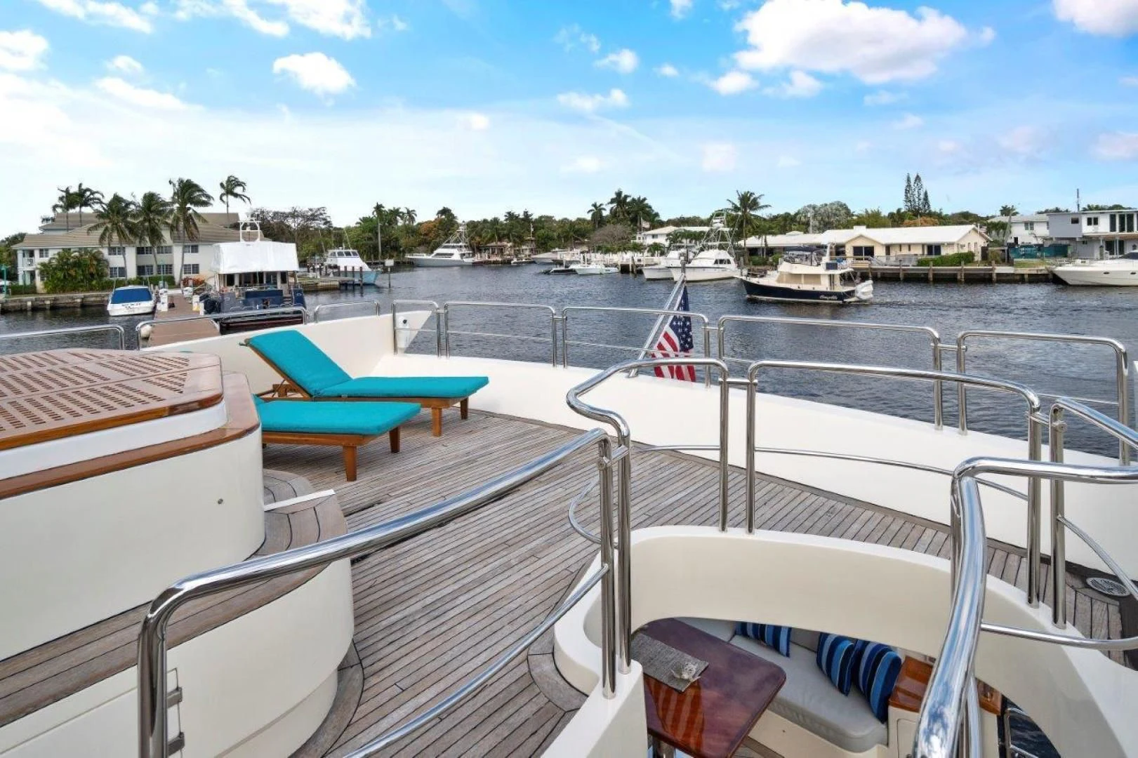 a boat is parked on the side of the water aboard VIVERE Yacht for Sale
