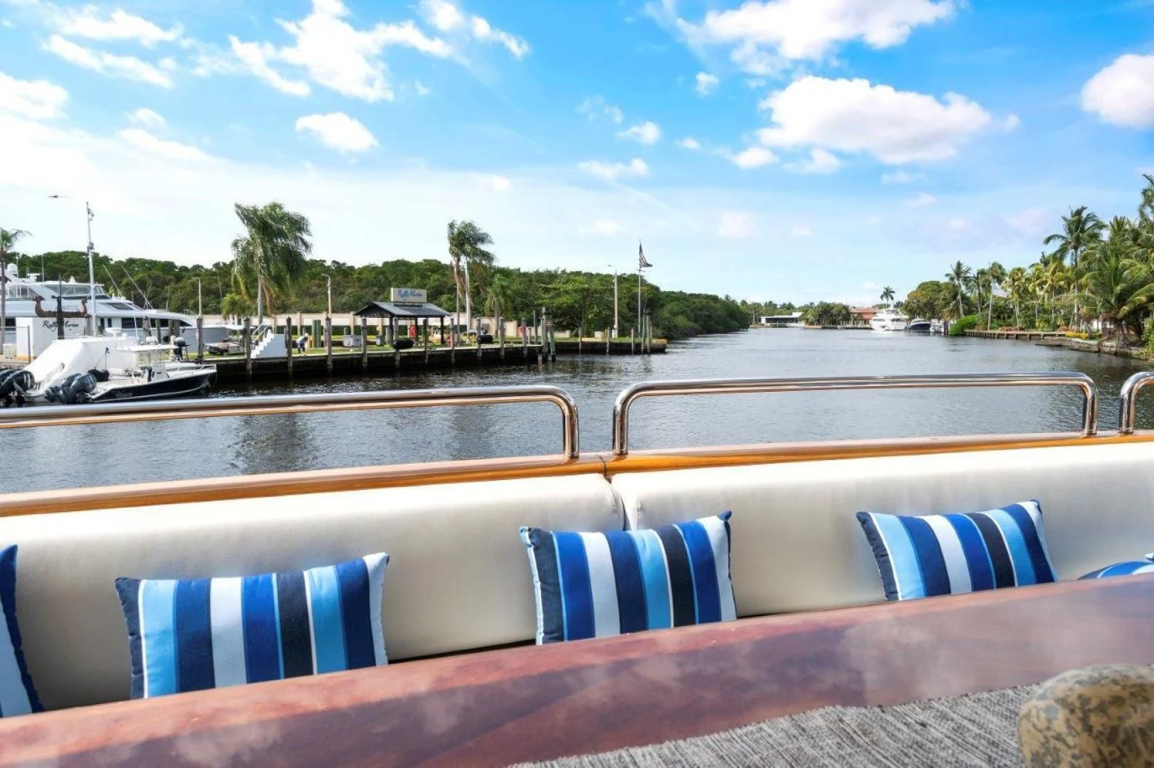 a pool with chairs by it aboard VIVERE Yacht for Sale