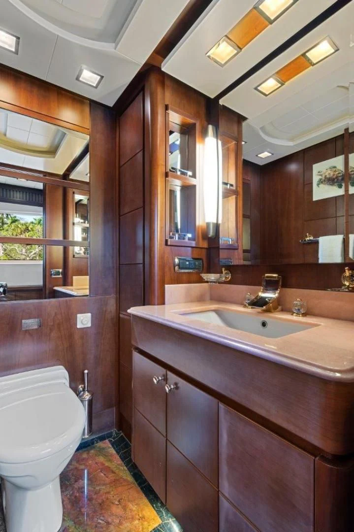 a bathroom with a sink and a toilet aboard VIVERE Yacht for Sale