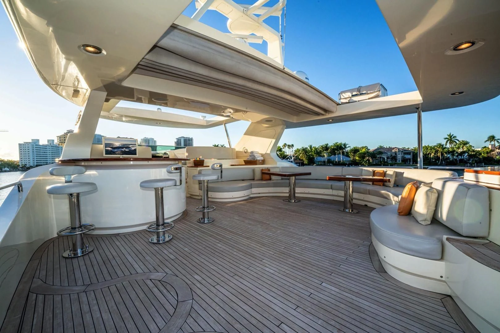 a large room with a large white lounge chair and a large white building aboard VIVERE Yacht for Sale