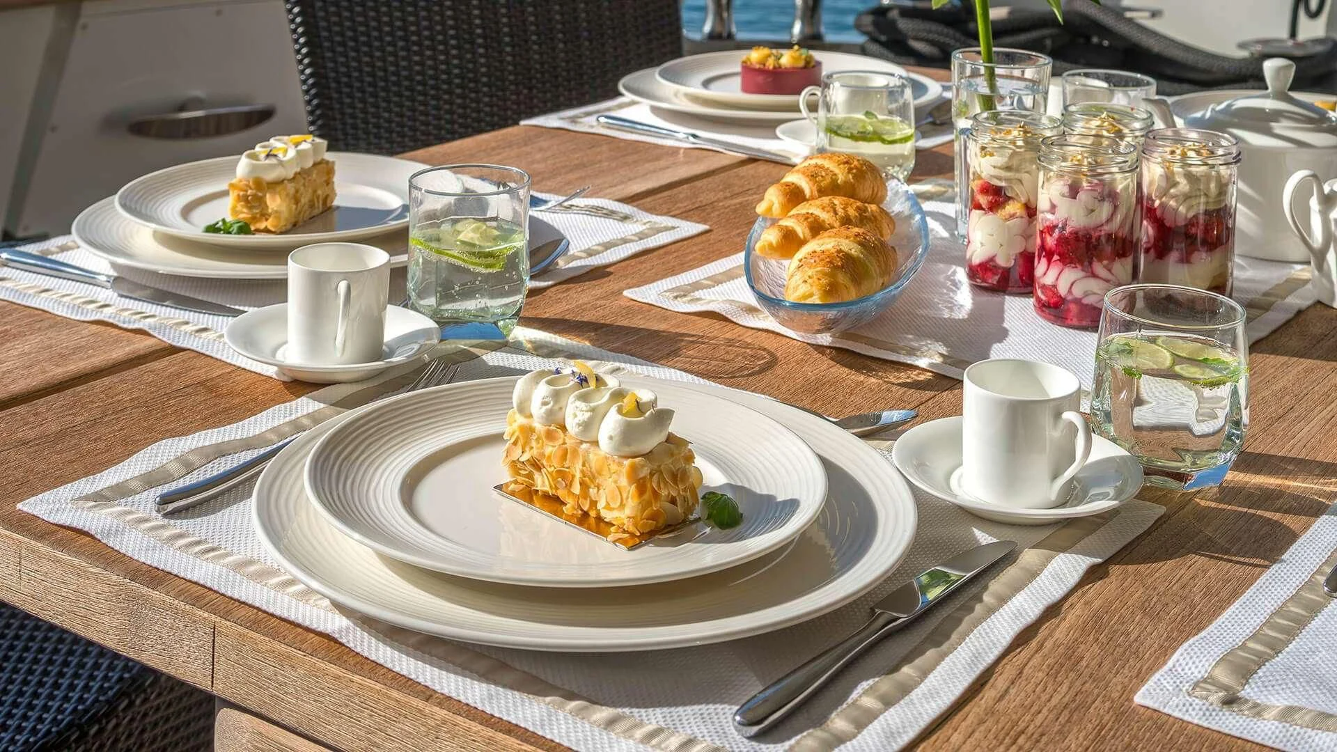 a table with food and drinks aboard JANTAR Yacht for Charter