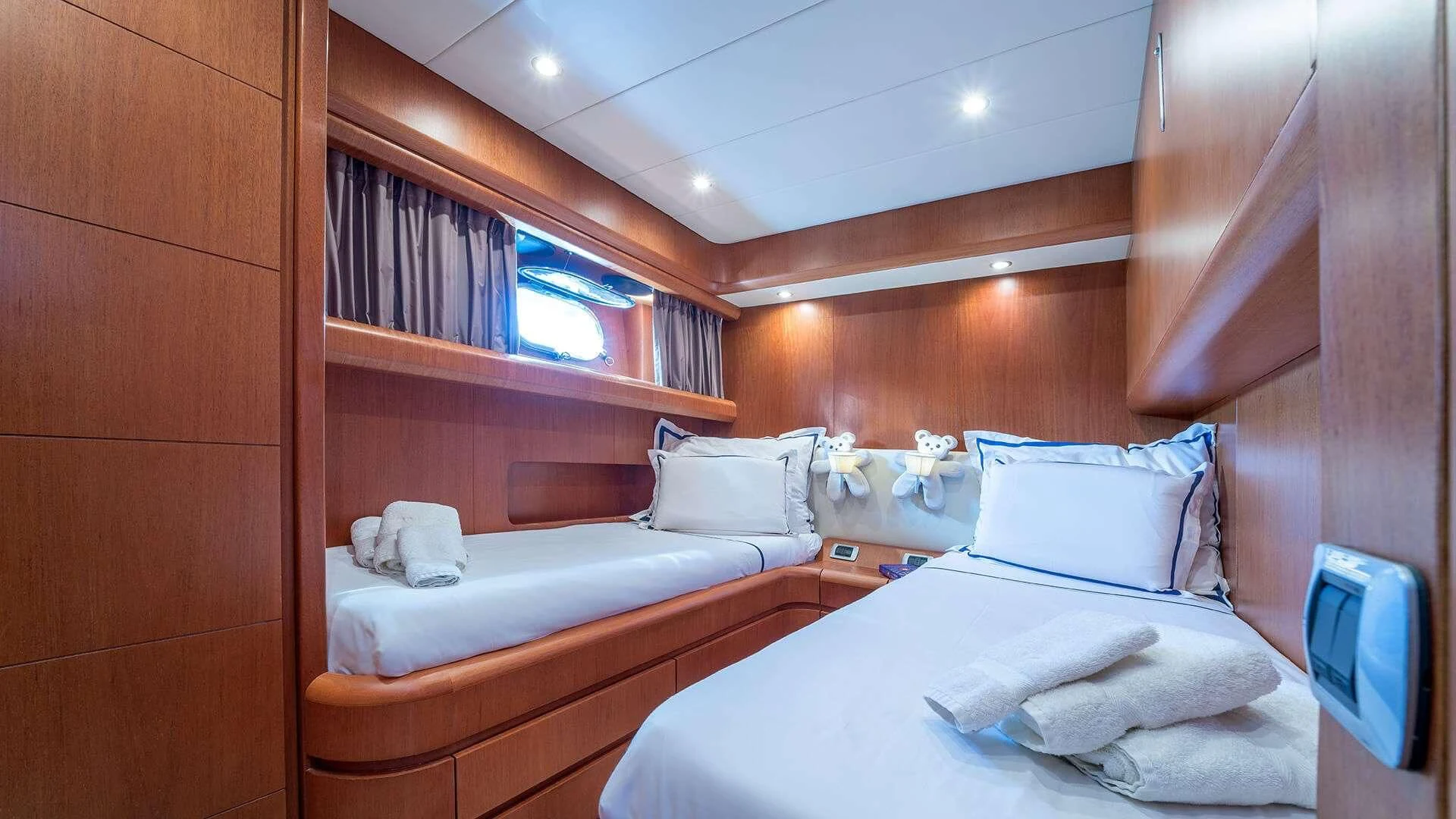 a room with two beds aboard JANTAR Yacht for Charter