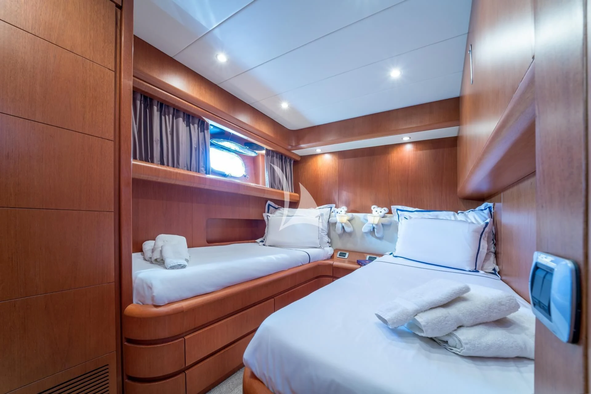 a room with two beds aboard JANTAR Yacht for Charter