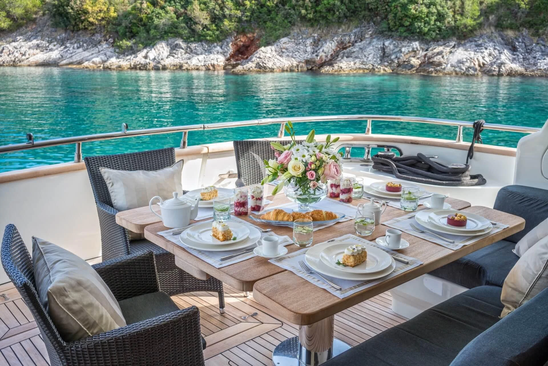 a table with food on it aboard JANTAR Yacht for Charter