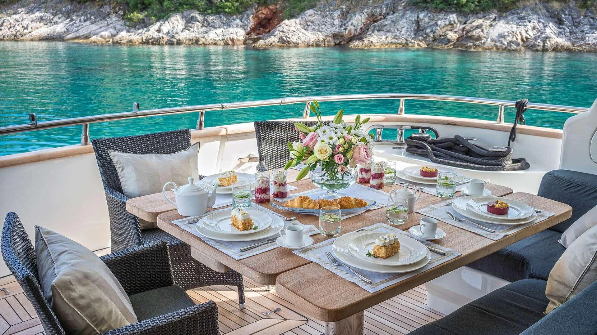 a table with food on it aboard JANTAR Yacht for Charter