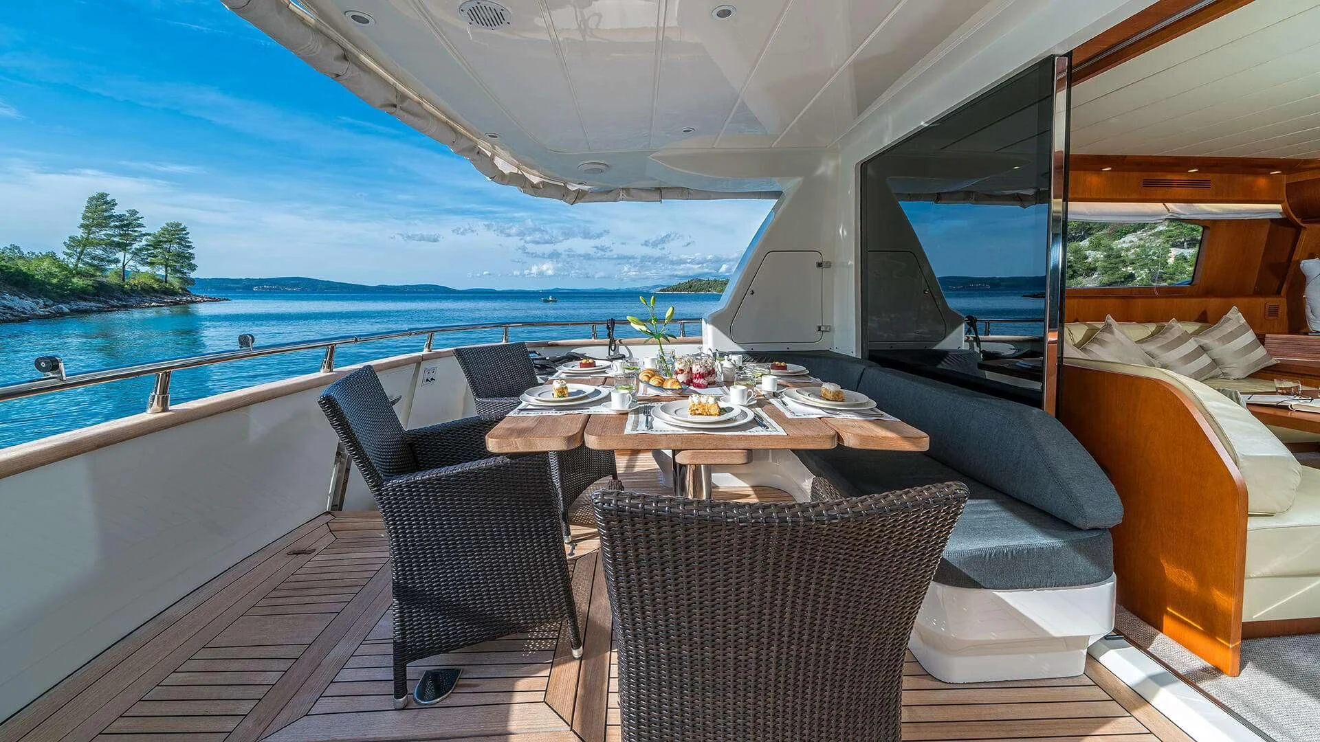 a table on a boat aboard JANTAR Yacht for Charter