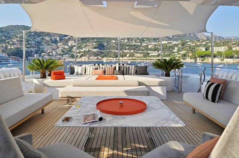 a large patio with a table and chairs aboard SEAHORSE Yacht for Sale