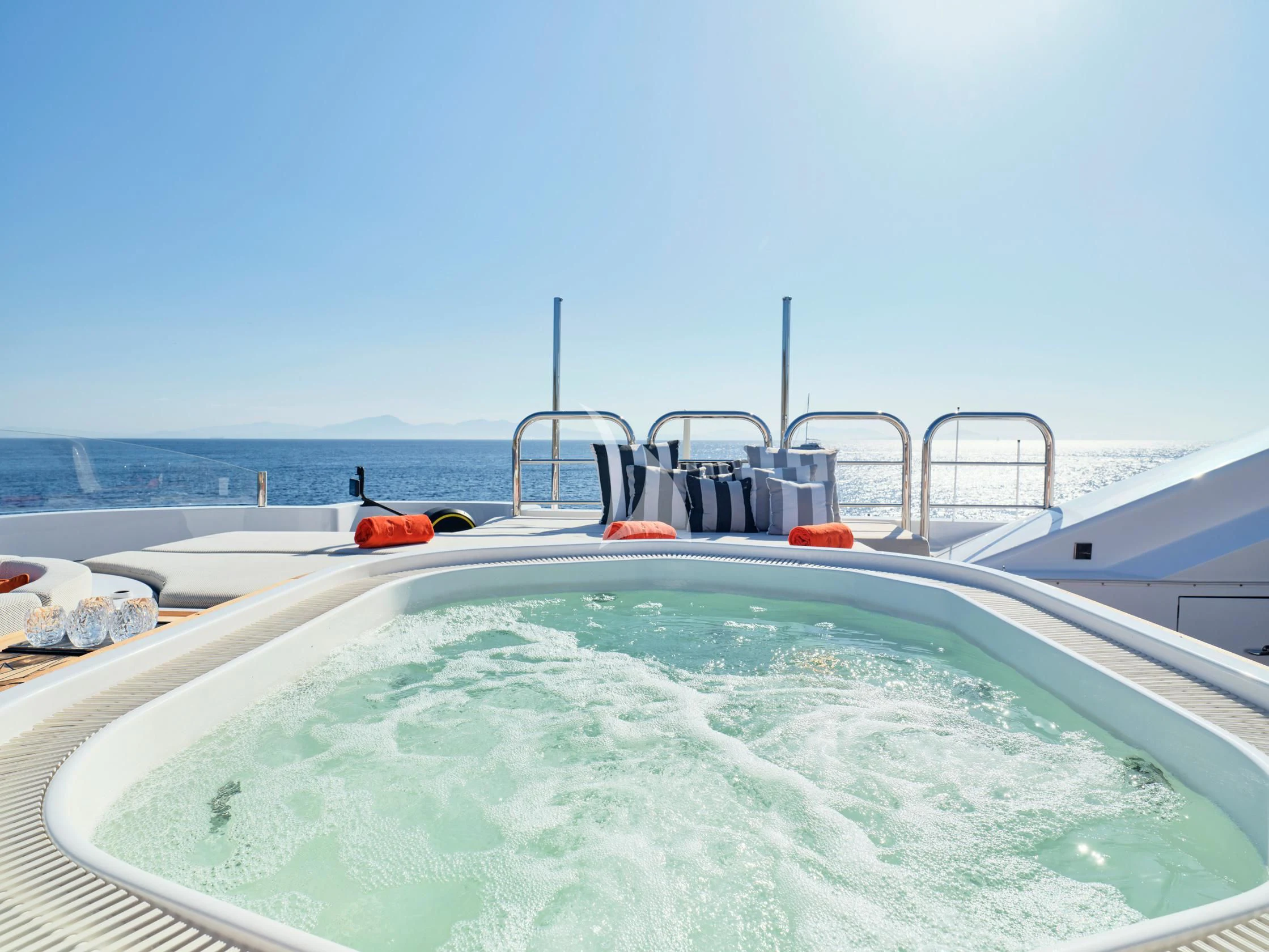 a swimming pool with a large white net and a red buoy aboard SEAHORSE Yacht for Sale