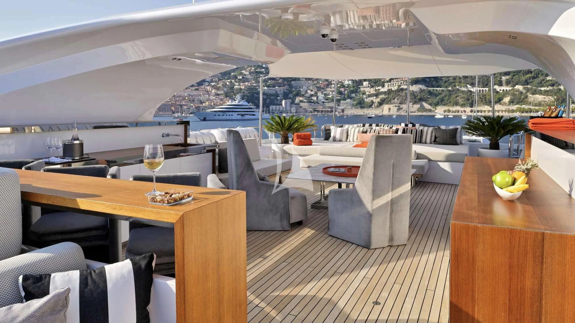 a room with a table chairs and a large white tent aboard SEAHORSE Yacht for Sale