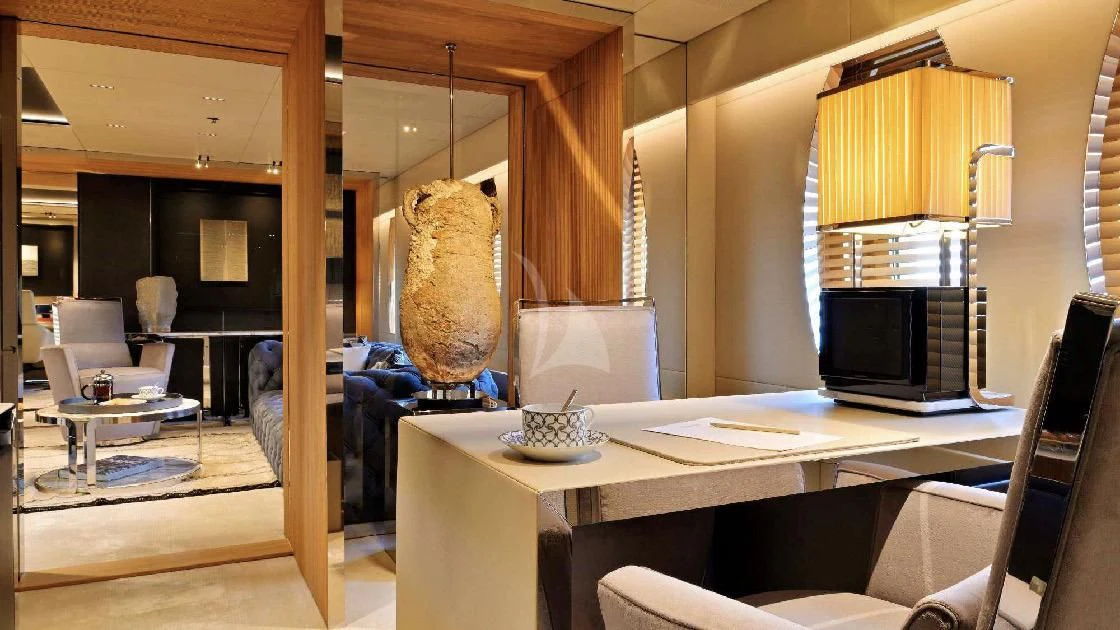 a room with a table and chairs aboard SEAHORSE Yacht for Sale